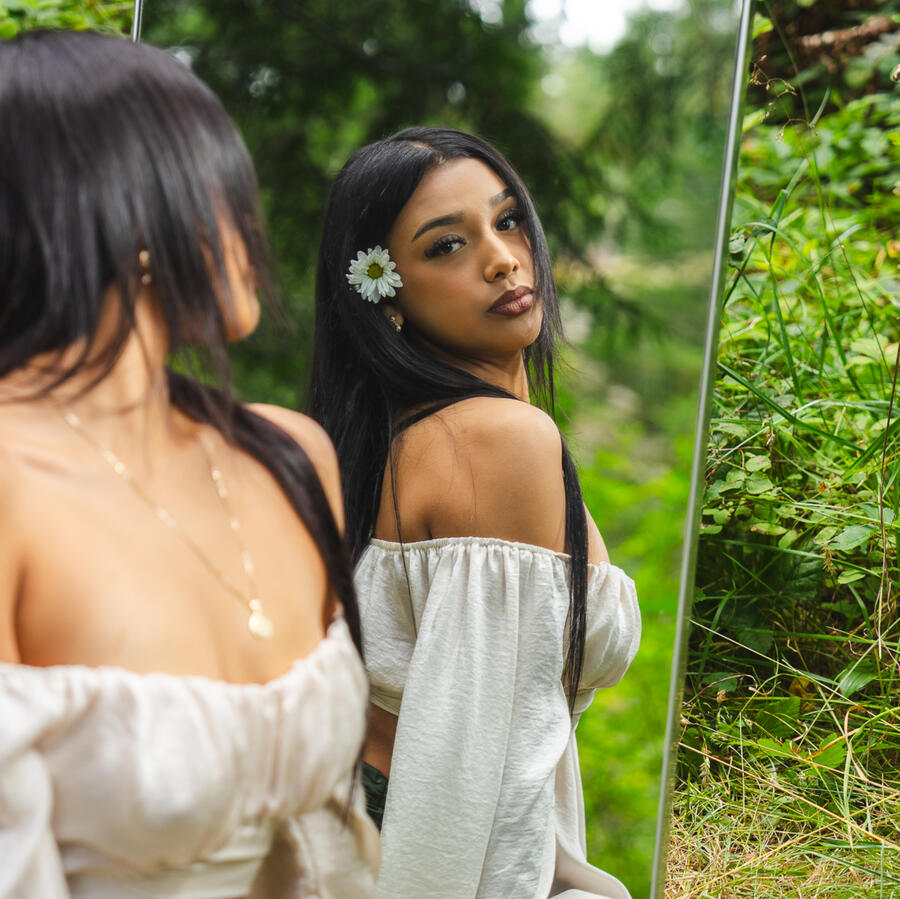 Model posing in the forest